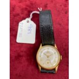 A gents Record wrist watch with seconds dial 9ct with presatation inscription