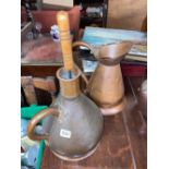 An antique copper jug and another