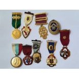 a bag of assorted masonic medals