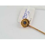 A good gold stick pin with sapphire target terminal 9ct