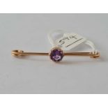 A gold and amethyst set brooch 3.5 gms