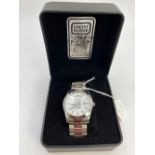 A cased Credit Suisse 1gm platinum 999.5 gents wrist watch with origanal strap