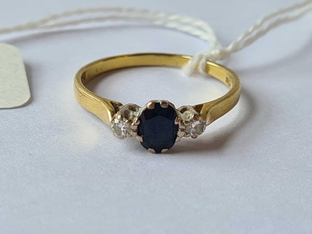 A diamond and sapphire ring 18ct gold size q - 2.5 gms