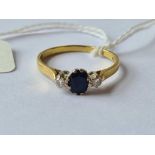 A diamond and sapphire ring 18ct gold size q - 2.5 gms