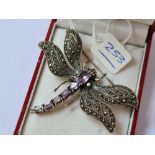 A boxed silver and amethyst dragonfly brooch