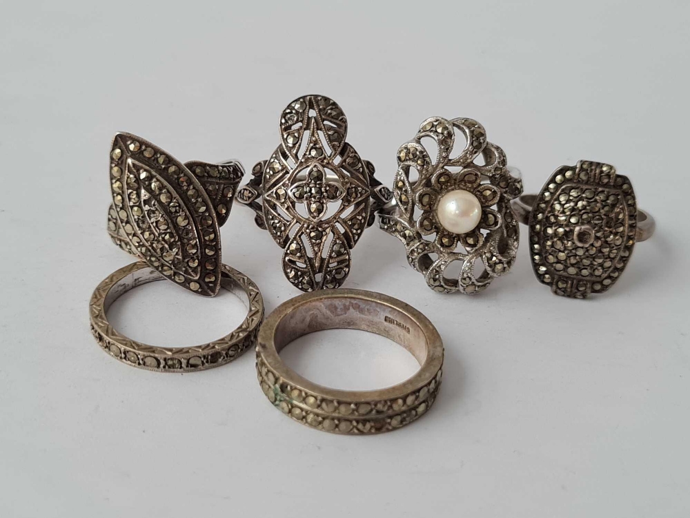 Six silver and marcasite rings