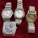 Four assorted wrist watches