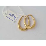 A pair of 9ct earrings - 1.5 gms