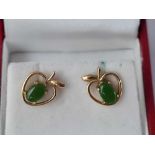 A pair of green stone stud earrings boxed