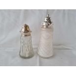 Two silver mounted castors with glass bodies