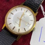 A GENTS OMEGA GENEVE WRIST WATCH WITH SECONDS SWEEP AND DATE APPATURE