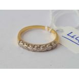 A diamond half hoop ring 18ct gold size N - 2.3 gms