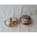 Two muffin dishes, covers and liners