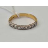 A nine stone diamond half eternity ring 18ct gold size N - 2.4 gms