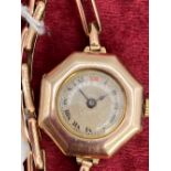 A LADIES OCTAGONAL ROLEX WRIST WATCH 9CT WITH 9CT WATCH STRAP - 18.4 GMS INC