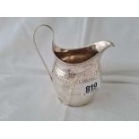George III Cream jug with loop handle and Bright cut band. London 1901