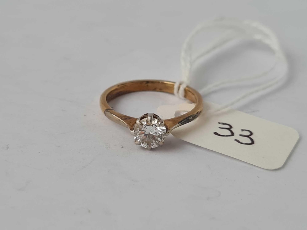 A SOLITAIRE DIAMOND RING 18CT GOLD SIZE J - 2.2 GMS