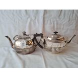 Two oval half fluted teapots