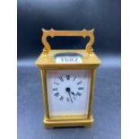 A French brass case travelling clock