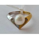 A pearl and diamond ring 18ct gold size O - 4.8 gms