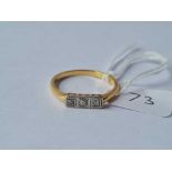 An Edwardian three stone diamond ring in 18ct gold size S 3.3g inc