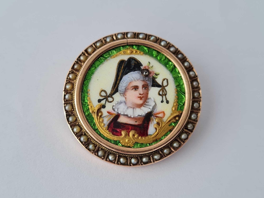ANTIQUE VICTORIAN CIRCULAR BROOCH, THE CENTRE ENAMELLED OF A WOMAN IN TRADITONAL COSTUME WITH A