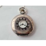 A gents silver half hunter pocket watch with seconds dial W/O