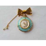 A ladies enamel nurses watch on 9ct suspension bow