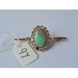 A Ceylon opal and white sapphire brooch AF