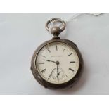 A large metal cased pocket watch by Illinois watch Co with seconds dial