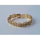 A GOOD QUALITY THREE TIERED GATE STYLE BRACELET 9CT - 18.5 GMS