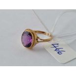 An oval stone amethyst ring 9ct size H 1/2 - 1.7 gms