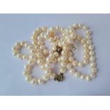 Two pearl necklaces with magnetic clasps