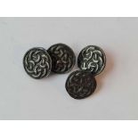 A pair of Celtic style silver cufflinks