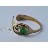 An unusual silver and green stone torque bangle 37g inc