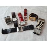 A bag of assorted fashion watches