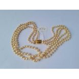 A three row pearl bead necklace with 9ct clasp 55.5g inc