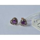 A pair of amethyst and diamond heart shaped earrings 9ct