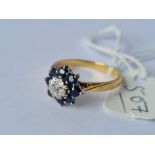 A diamond and sapphire ring 18ct gold size O - 3.9 gms