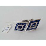 A PAIR OF DECO STYLE SAPPHIRE AND DIAMOND LOZENGE SHAPED WHITE GOLD CUFFLINKS WITH FULL SIGNATURE OF