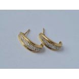 A pair of small curl earrings 9ct - 2.3 gms