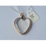 A heart shaped double sided glass locket 9ct