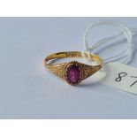 A antique Victorian garnet ring 22ct gold size T