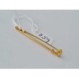 An antique gold riding crop brooch 9ct - 2 gms