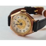 A ladies octagonal wrist watch 9ct