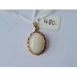 A gold mounted opal pendant 9ct