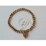 A CURB LINK BRACELET WITH HEART PADLOCK 9 CT - 17.5 GMS