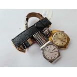 Four assorted wrist watches