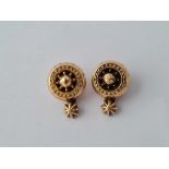 Pair gold cased target & star clip earrings