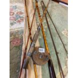 Two old fishing rods and one reel